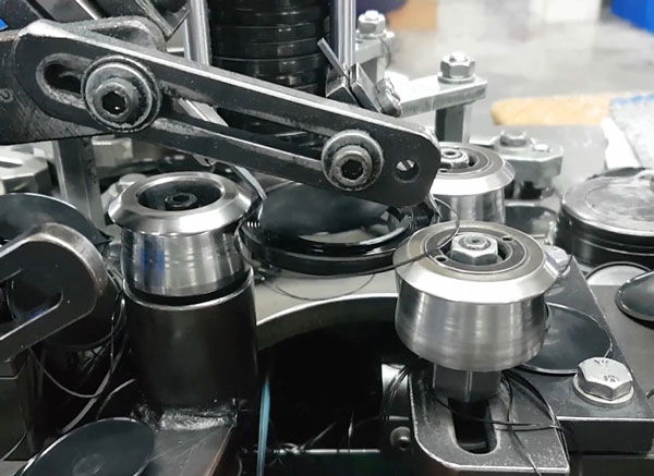 Automatic lip cutting and chamfering